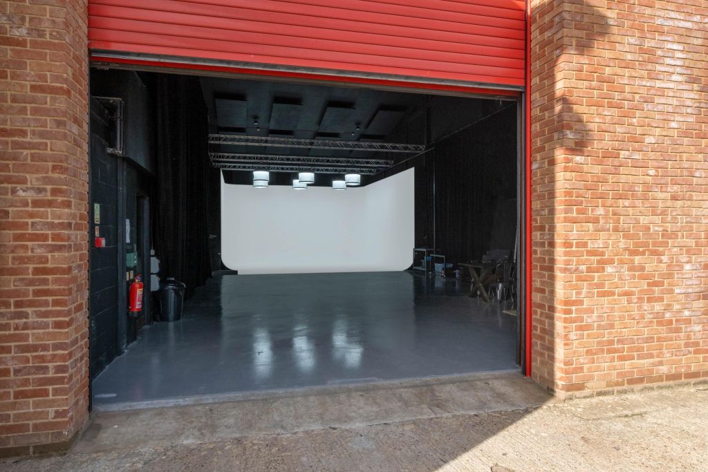 Studio 1- Shutter door looking onto the white cyc